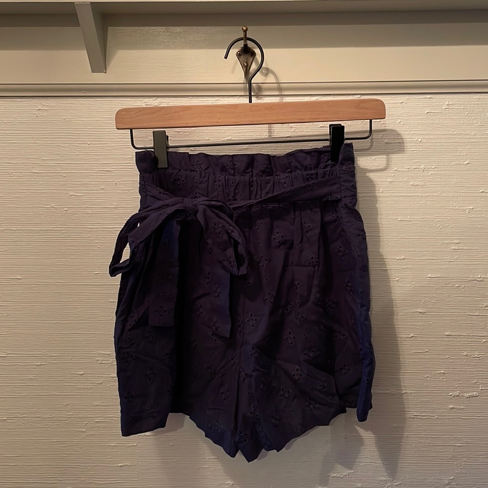 New with Tags!!! Francesca’s size S navy shorts.